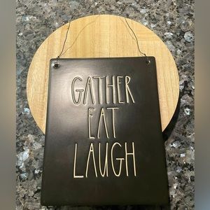 Small ceramic “Gather Eat Laugh” sign